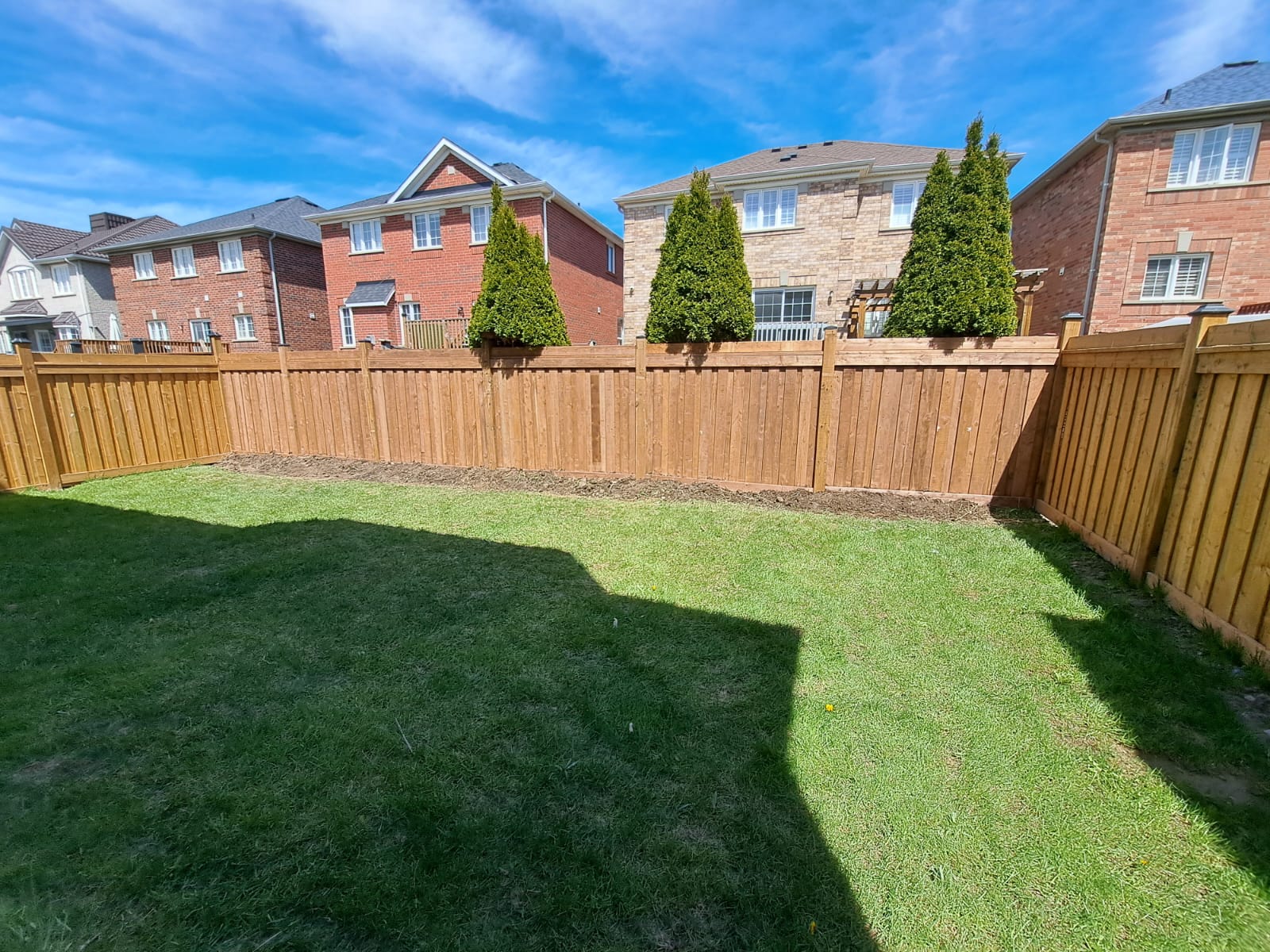 Premium Pressure-Treated Privacy Fence — after